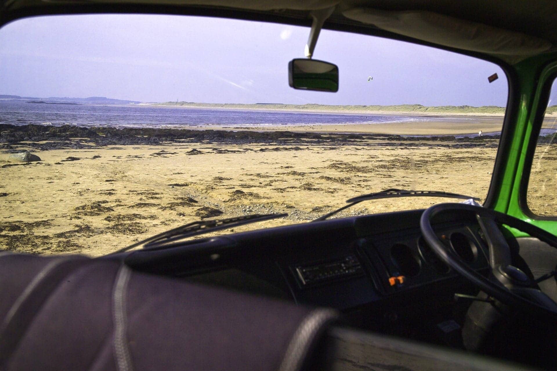 Beach view from a campervan