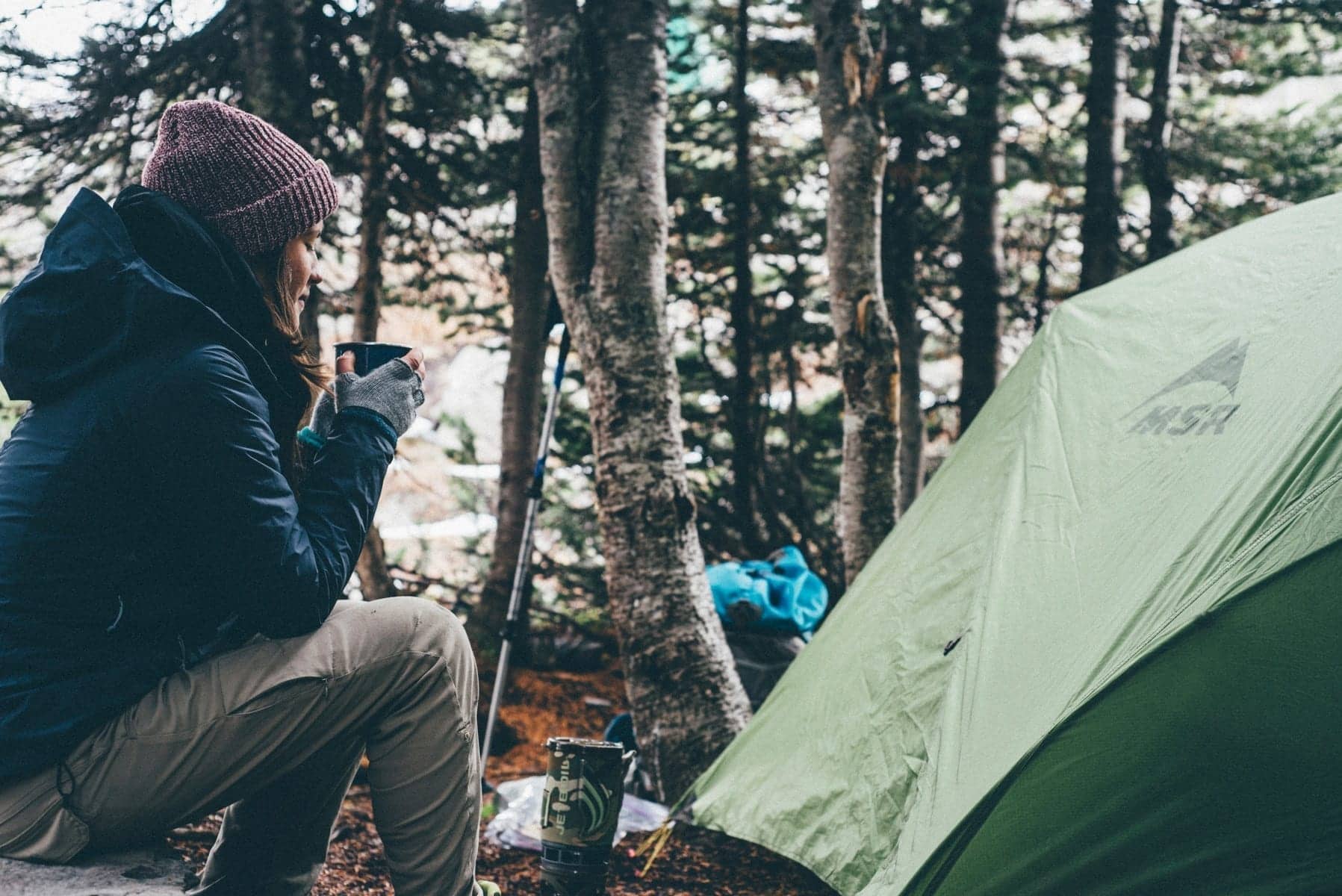 outdoor winter woman adventure camping season